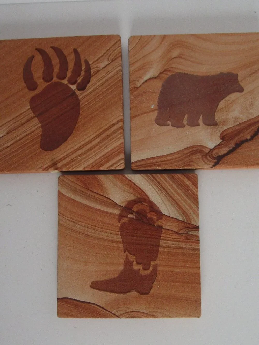 etched sandstone coaster set